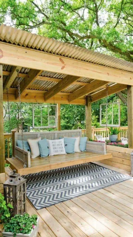 Pergolas are perfect for lounging areas, dining areas or even to protect your hot tub, as you will find among the pictures of pergola designs with roof we found and will present to you. For more ideas go to betterthathome.com