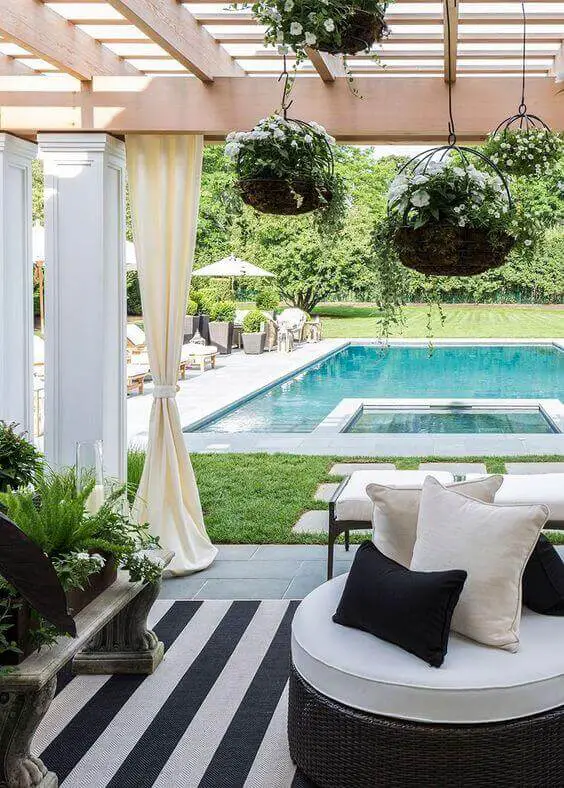 One can take these pool and pergola designs and adapt them to space they have available, either attached to the house or standing by itself, openly, or similar to a gazebo, at your pool’s side.