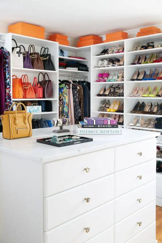 Photo of a luxurious closet design with storage space for shows