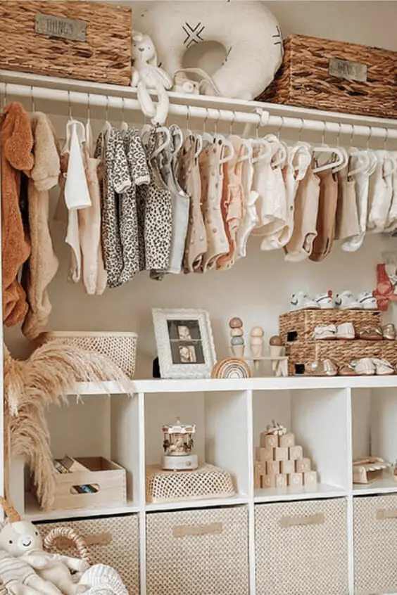 Photo of a nursery luxurious closet design.
