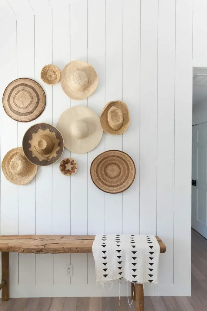 Photo of hats on the wall.