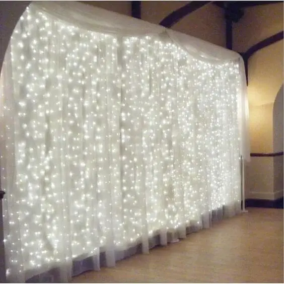 Photo of a curtain with lights.