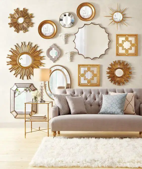 Photo of several mirrors hang up on the wall.