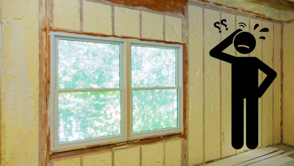 Photo of exposed spray foam insulation on walls near a window. Can Spray Foam Insulation Be Left exposed?