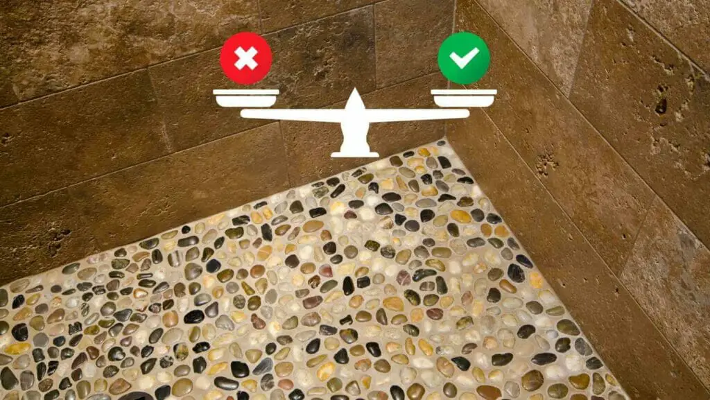 Photo of a pebble shower floor with a pros and cons scale. Pebble Shower . (In-Depth)