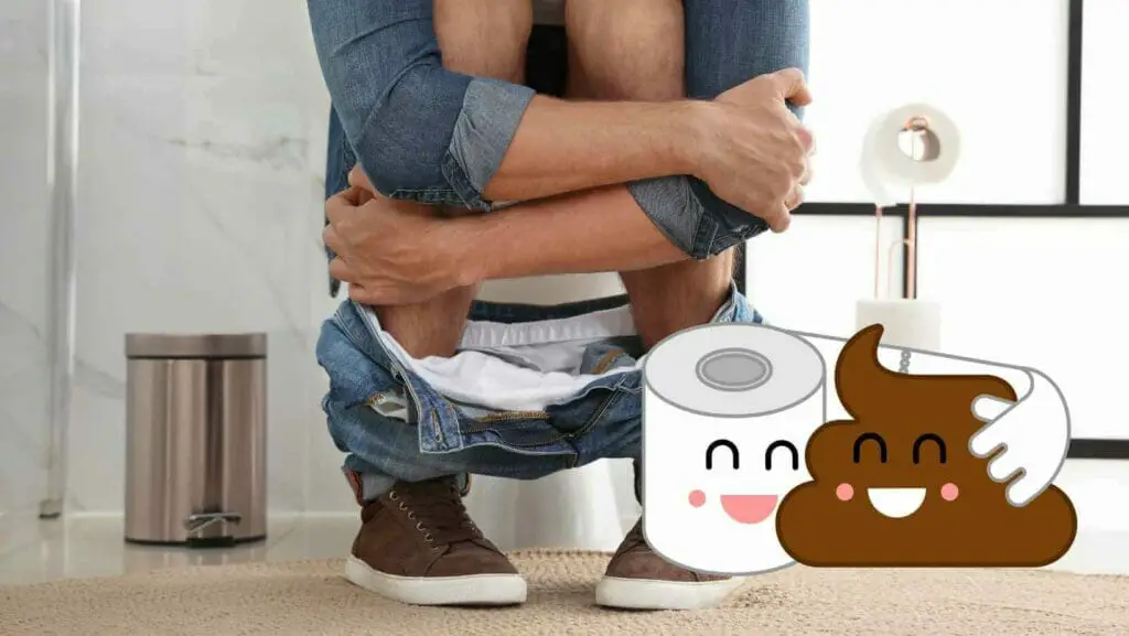 Photo of a man sitting on the toilet bowl. Prevent Poop from Sticking to Toilet Bowl