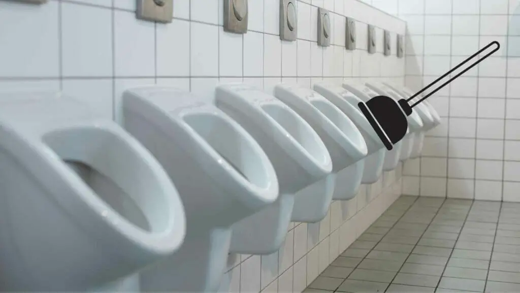 Photo of a bathroom with 9 urinals. Unclog Urinal.