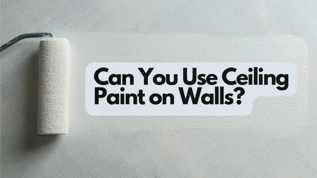 Photo of a wall paint roller with white paint on a wall. Can You Use Ceiling Paint on Walls?